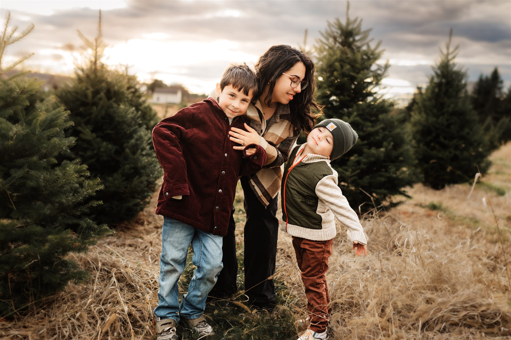 A mother smiling at her sons Merry Christmas Tree Farm Windham, ME