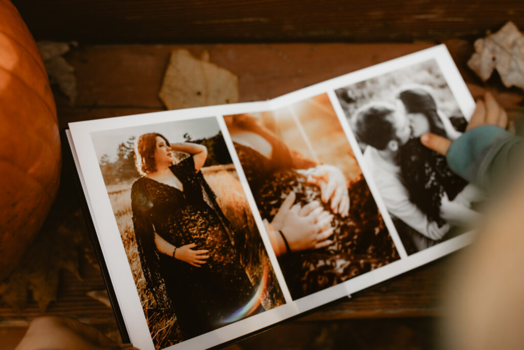 A photo album filled with maternity images