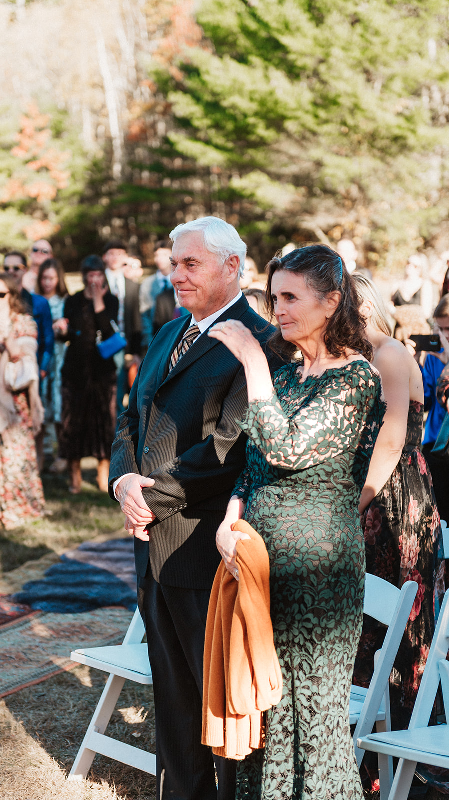 An emotional mother watching her child during their wedding ceremony